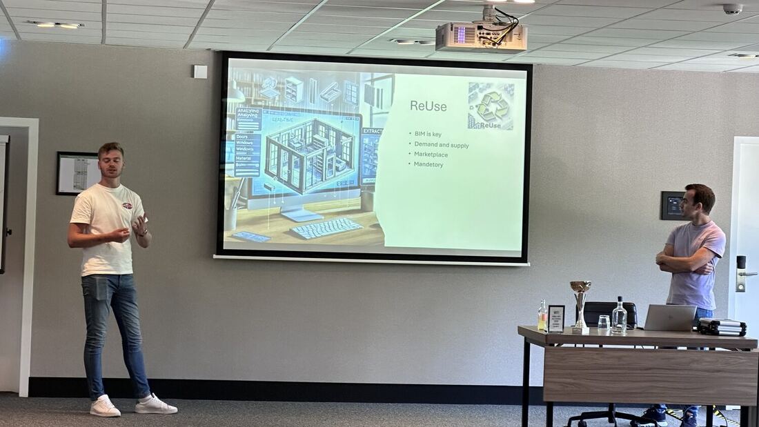 A student presents a slide showing a housing block diagram for the circularity brief.