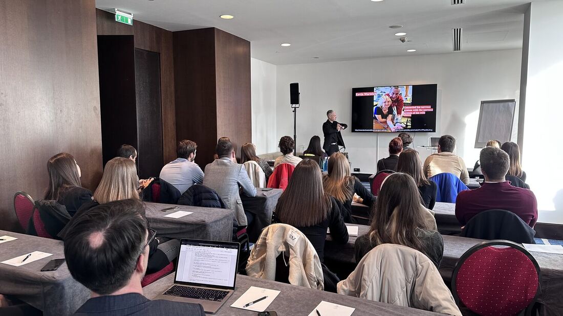 Delegates at laptops in the masterclass room