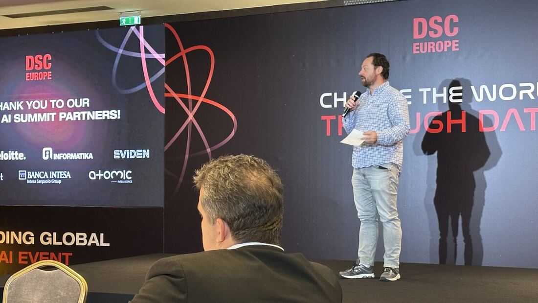 A speaker on stage during an evening session
