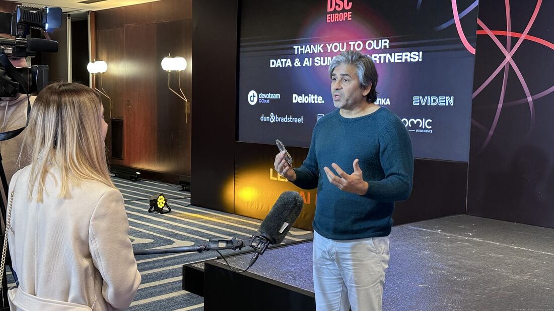 An interview being recorded in front of the partner screen
