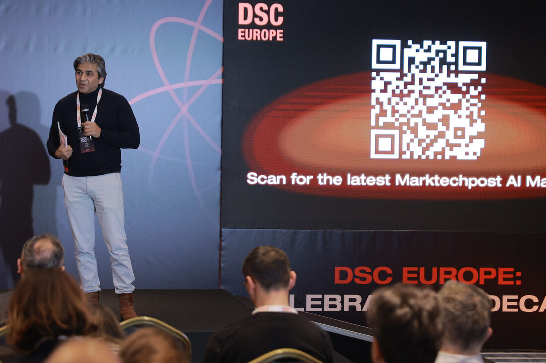 A speaker beside the Marktechpost QR code slide