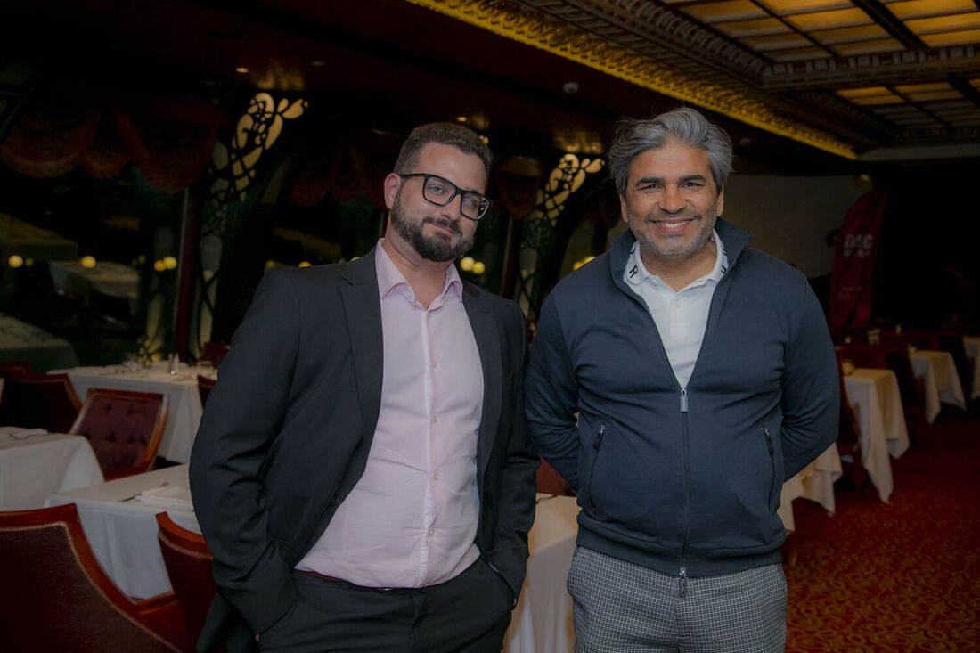 Two speakers photographed together at the DSC MENA welcome function on the evening of 19 April.