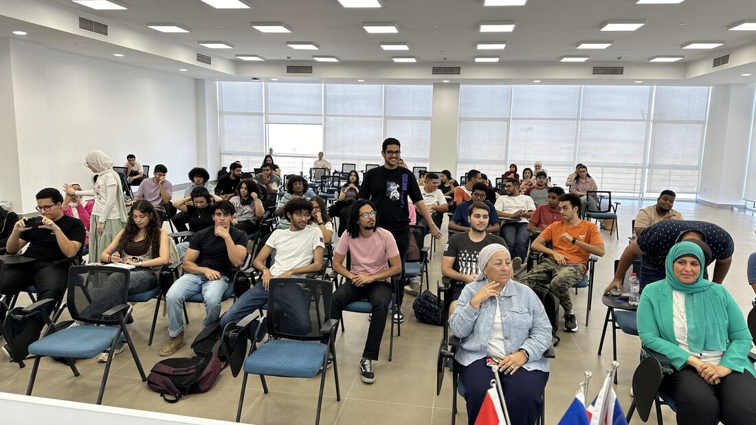 A lecture room of seated students and staff east of Cairo, 3 July 2024.