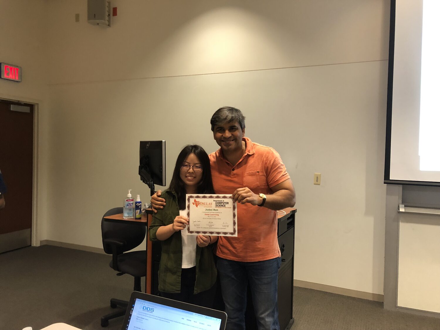 A delegate with the Deep Learning certificate at the front of the room