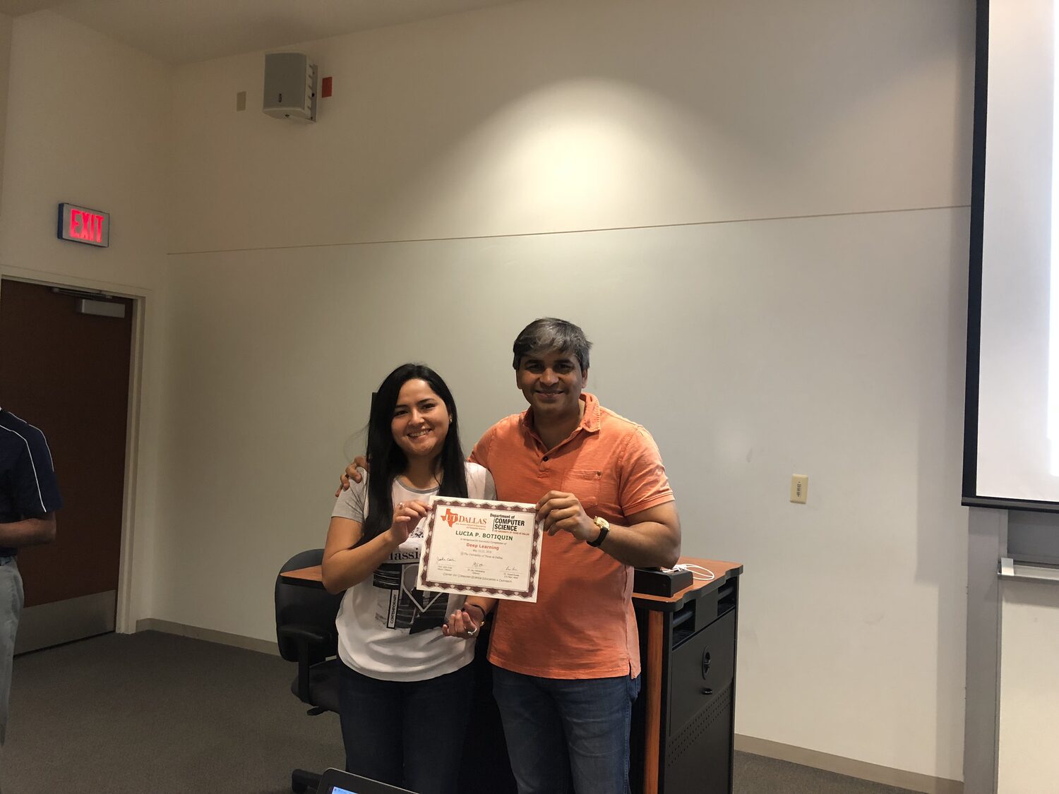 Certificate handover with the projected screen behind
